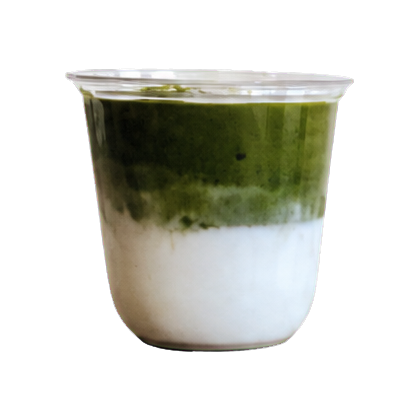 Iced classic matcha latte layered over milk in a clear cup